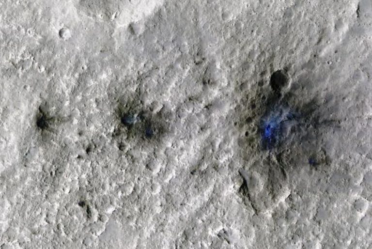 This is a picture of the first meteoroid impact found by NASA’s InSight mission. NASA's Mars Reconnaissance Orbiter took the picture. It used its High-Resolution Imaging Science Experiment (HiRISE) camera. Image Credit: NASA/JPL-Caltech/University of Arizona The Science Behind Meteorites Striking the Surface of Mars Daily